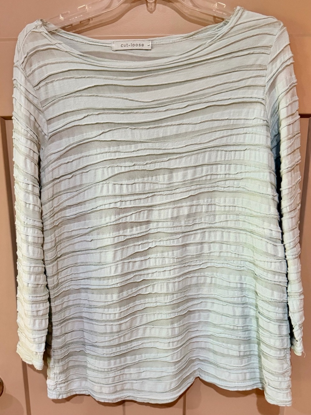 cut loose light green textured boatneck three quarter sleeve blouse